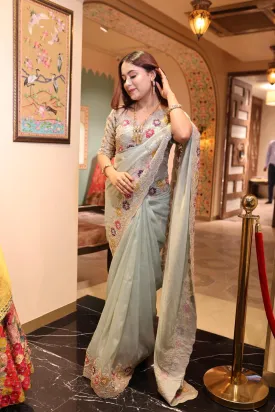 Pastel Green Embroidered Georgette Saree with Floral Blouse